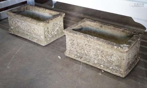 A pair of rectangular reconstituted stone garden planters, w...