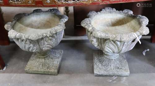 A pair of circular reconstituted stone garden planters mould...