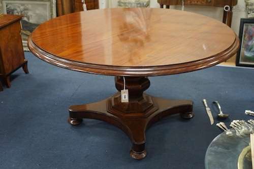 An early Victorian mahogany circular tilt top breakfast tabl...