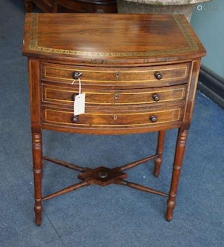 A Regency brass inlaid rosewood bowfront drop leaf work tabl...