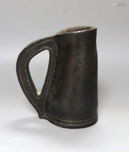 A Leather blackjack jug,19.5 cms high.