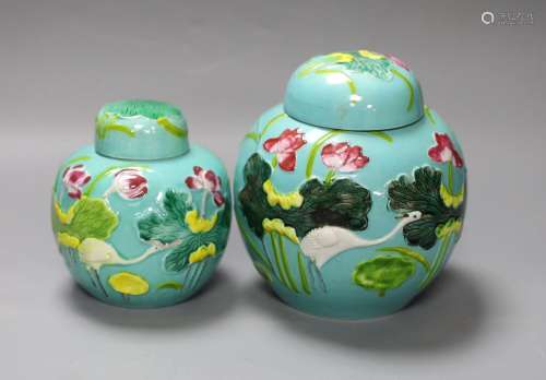 Two Chinese polychrome porcelain jars and covers, 20th centu...