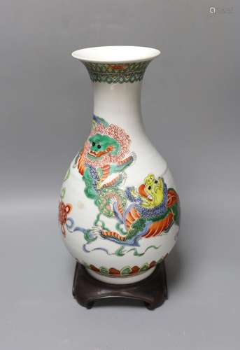 A Chinese famille verte pear shaped ‘Buddhist lion’ vase, on...