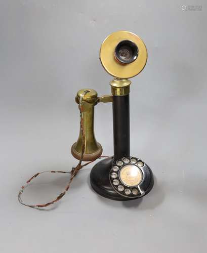 A brass mounted pillar telephone,34cms high.