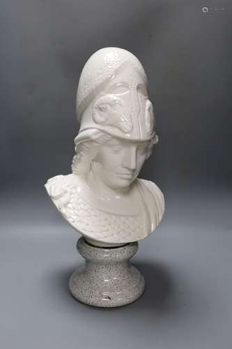 A white glazed ceramic portrait bust of Athena on faux marbl...