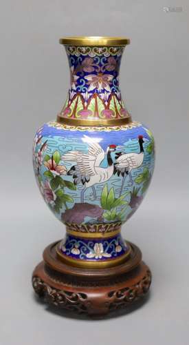 A Chinese cloisonne enamel vase, wood stand 32cm total heigh...