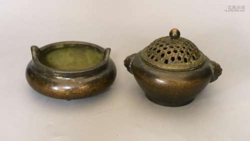 A Chinese bronze tripod censer and a Chinese bronze censer a...