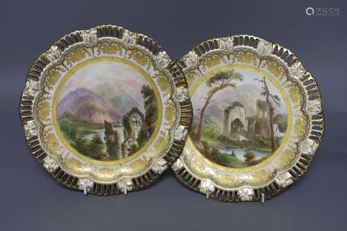 A pair of Coalport pierced border plates painted with named ...