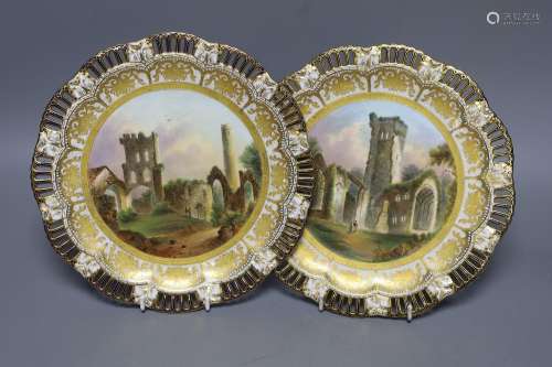A pair of Coalport pierced border plates painted with named ...