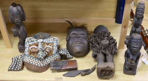 A group of Democratic Republic of Congo tribal carved wood f...
