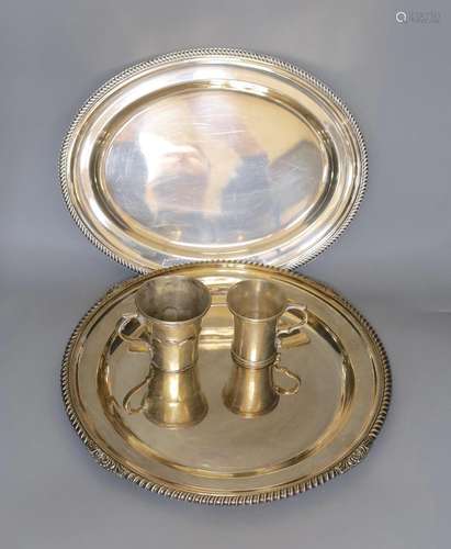 A silver plated tray, an oval plated serving dish and two si...