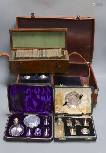 Three cased communion sets together with a mahogany box of s...