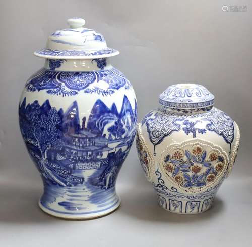 A large Chinese blue and white jar and cover and a blue and ...