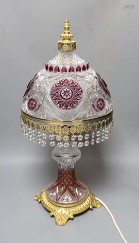 An amethyst flashed cut glass and ormolu table lamp,58 cms h...