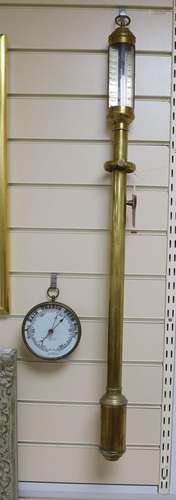 A marine stick barometer and an aneroid barometer,stick baro...