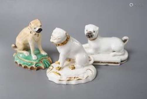 A Derby pug dog with white and gilt decoration, another pug ...