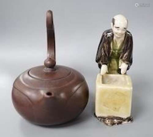 A Yixing teapot and a Japanese pottery figural brush washer ...