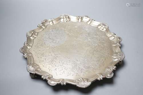 A late George II silver salver, with later engraved decorati...