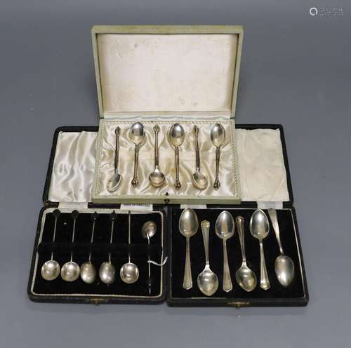 Two cased sets of six silver coffee spoons and a similar Dan...