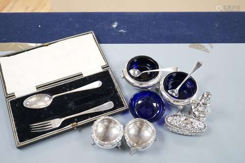 A pair of Victorian silver bun salts with blue glass liners ...