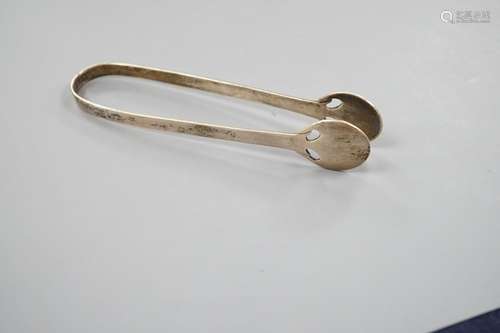 A pair of Edwardian Liberty & Co Cymric sugar tongs, Bir...