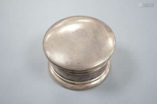 A George VI part engine turned silver circular powder box, A...