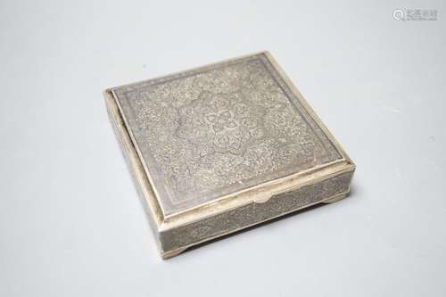 A Persian engraved white metal and niello cigarette box, sta...