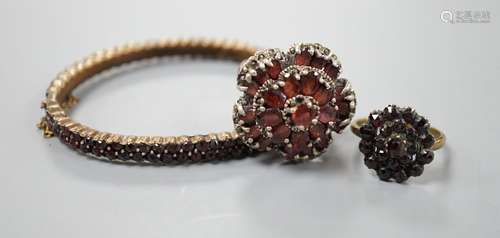 A Victorian garnet cluster set gilt metal dress ring, one ot...