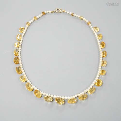 A single strand oval cut citrine and seed pearl set fringe n...