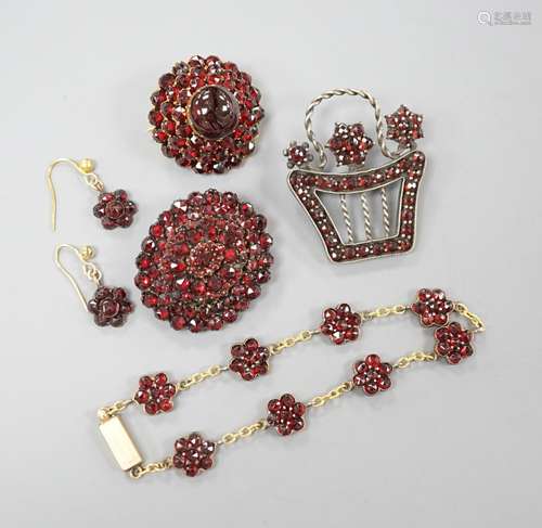 A Victorian gilt metal and facetted garnet set cluster brooc...