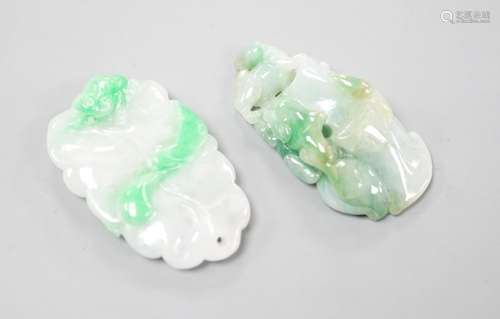 Two carved jade pendants, largest 45mm.