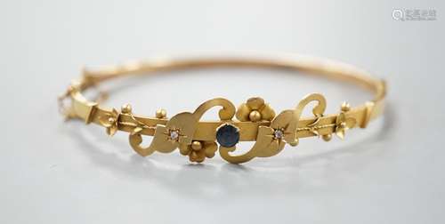 An early 20th century yellow metal, sapphire and diamond chi...