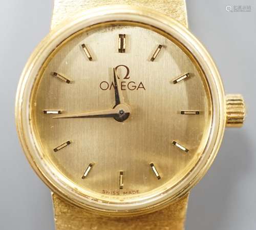 A ladys 18ct gold Omega manual wind wrist watch,gross 27.3 g...