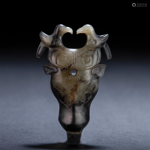 A Chinese Carved Russet Jade Buffalo Head Han Dyn.