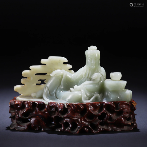 A Chinese Carved White Jade Buddha Qing Dyn.