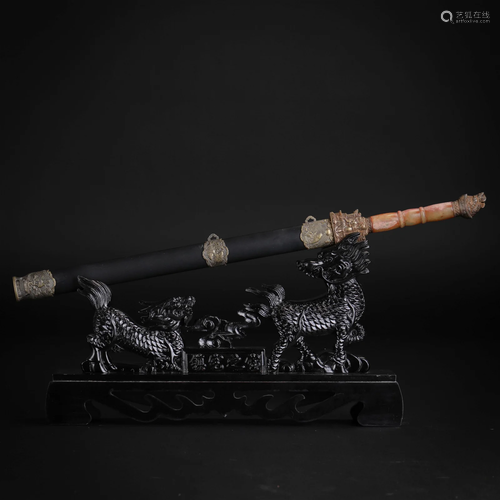 A Chinese Carved Jade Sword