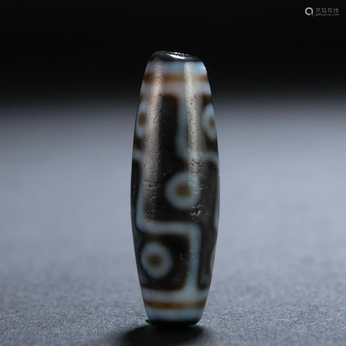 A Tibetan Dzi Bead