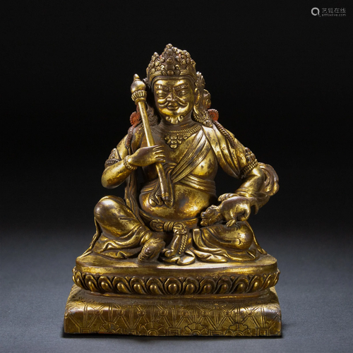 A Tibetan Bronze-gilt Seated Jambhala