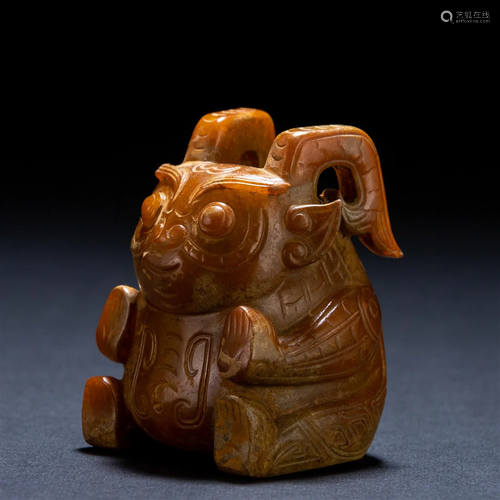 A Chinese Carved Russet Jade Beast Han Dyn.