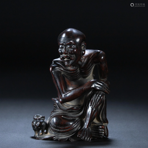 A Chinese Carved Rosewood Seated Arhat Qing Dyn.