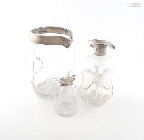 A small collection of silver-mounted glass items, comprising...