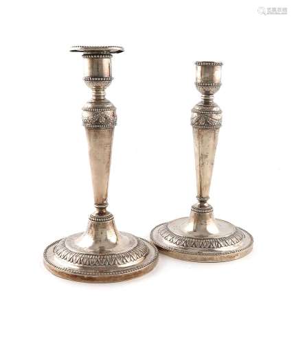 A pair of late 18th century Danish silver cast candlesticks,...