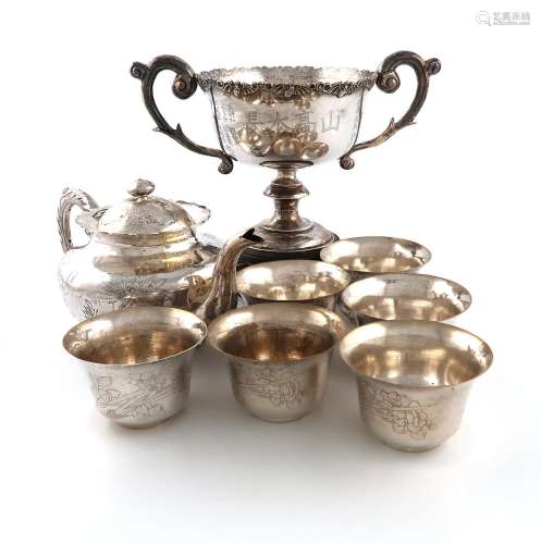 A collection of Chinese silver items: comprising: a presenta...