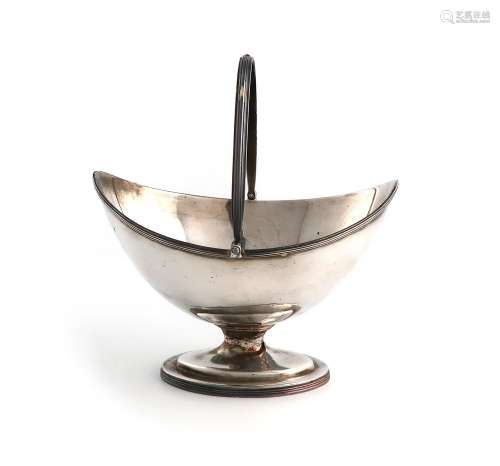 A George III silver swing-handled sugar basket, by Solomon H...
