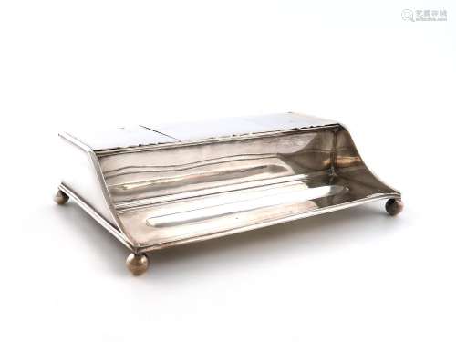 A silver inkstand, by Carrington and Co., London 1913, recta...