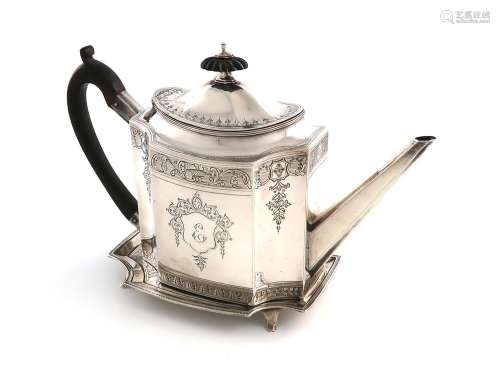 A George III silver teapot and matching stand, by John Robin...