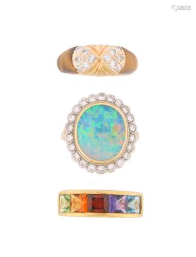 Three gem-set rings, a boulder opal and diamond cluster ring...