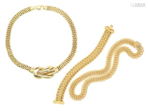 A fancy link gold necklace with conforming bracelet, and a c...