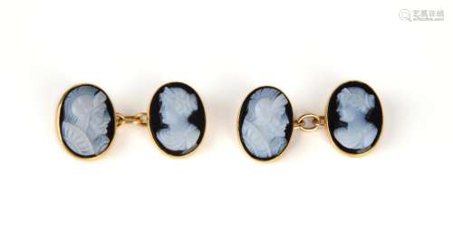 A pair of hardstone cameo-mounted gold cufflinks, the cameos...
