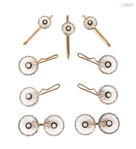 A set of dress cufflinks and studs, each centred with a seed...